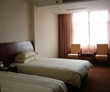 Oriental Holiday Hotel Hangzhou Room photo